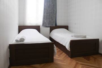 Фото номера Двухместный номер с 2 отдельными кроватями и собственной ванной комнатой Гостевой дом Bagration г. Гори 10